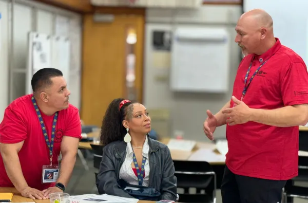 LUDL talking with members